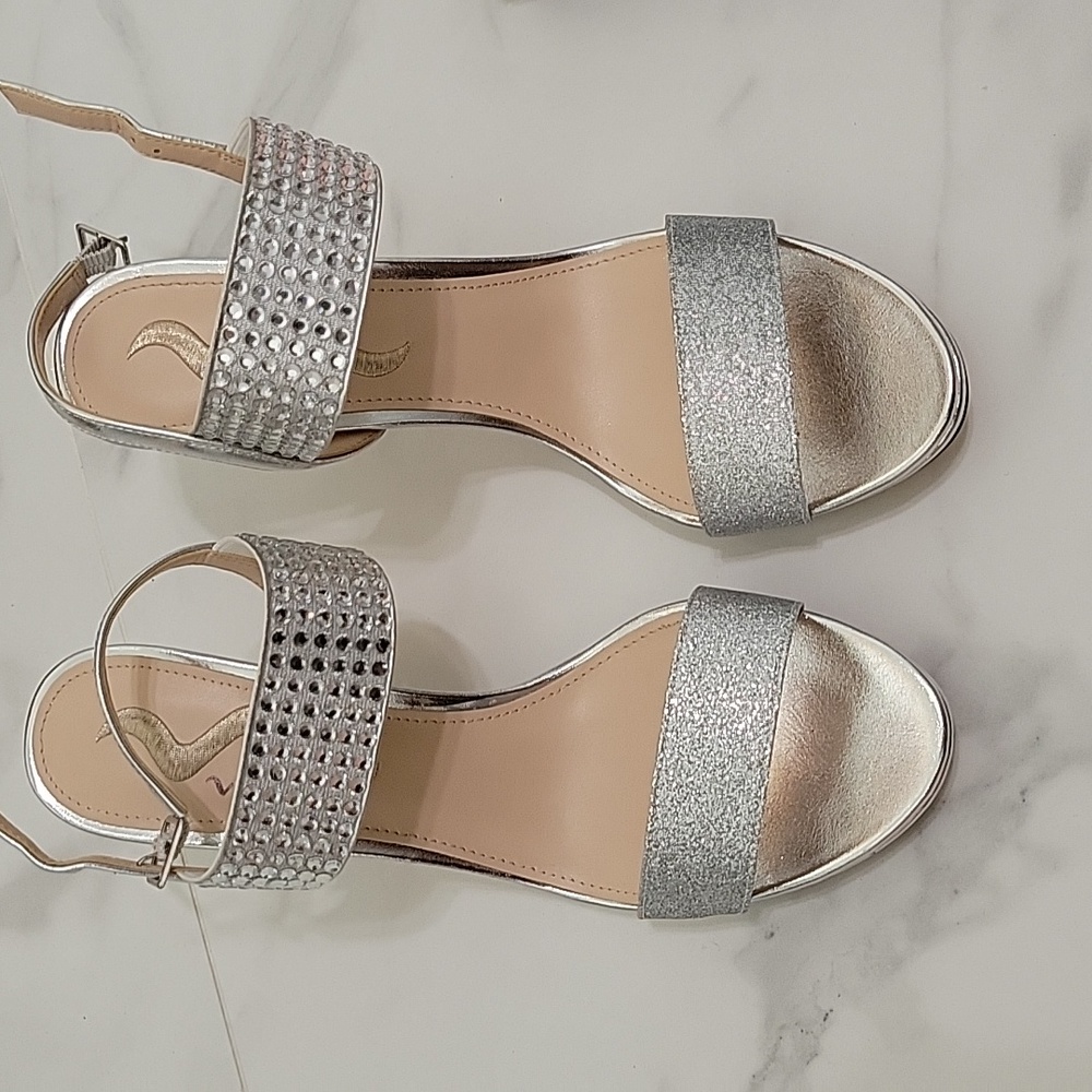 NEW woman 10M silver high hills